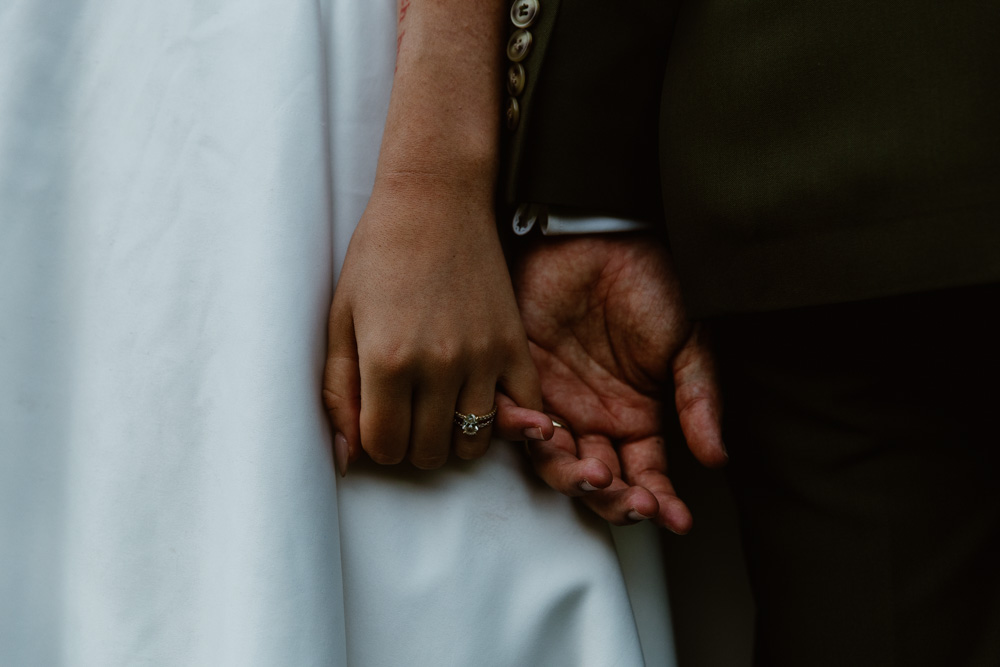 Recently married couple holding hands